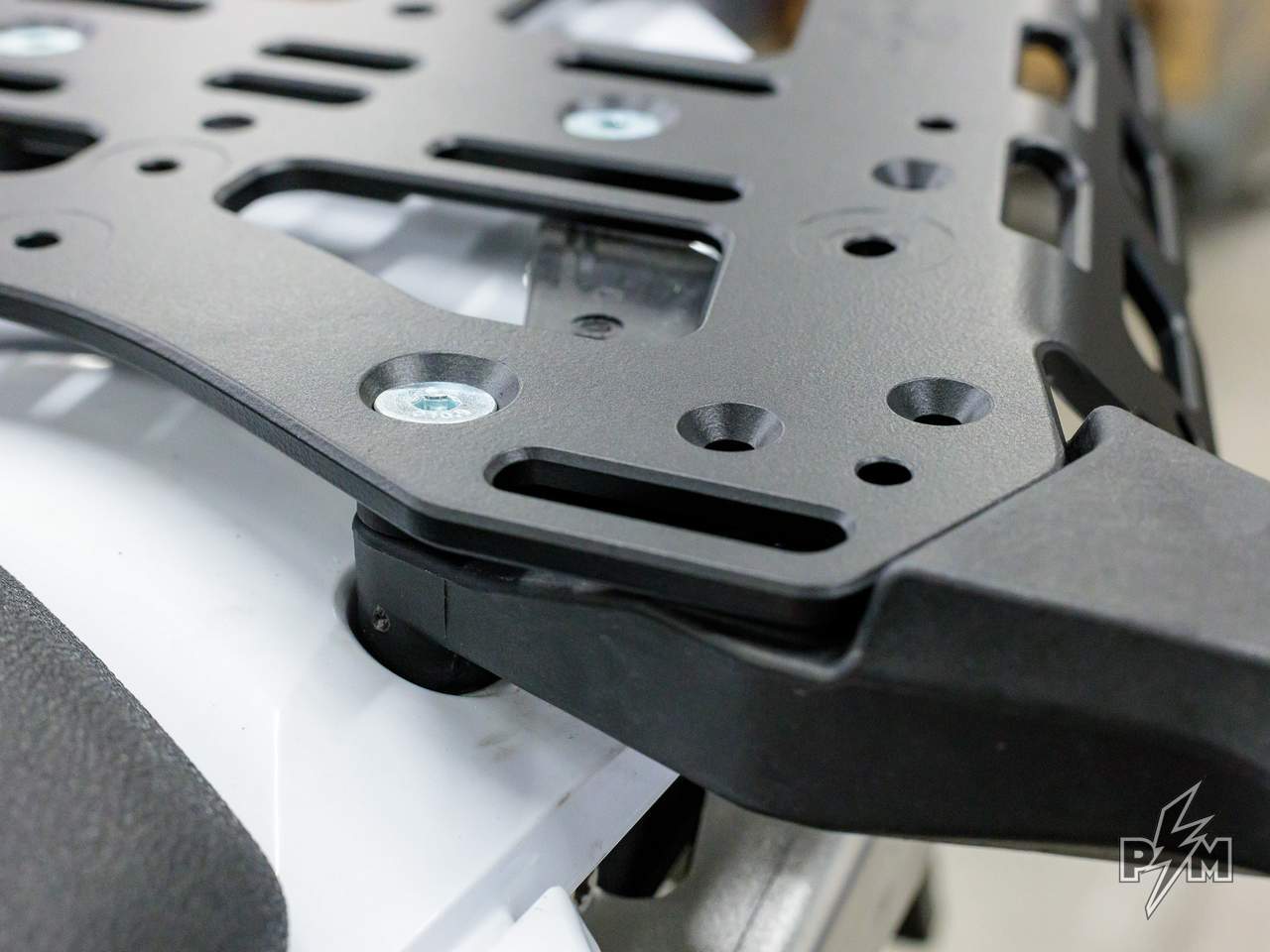 Perun moto Billet top rack Large for KTM 790 & 890 Adventure installed with OEM grab handles - close-up detail of fitment