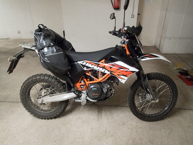 Giant loop Coyote on KTM 690 Enduro with Perun moto Heel Guards