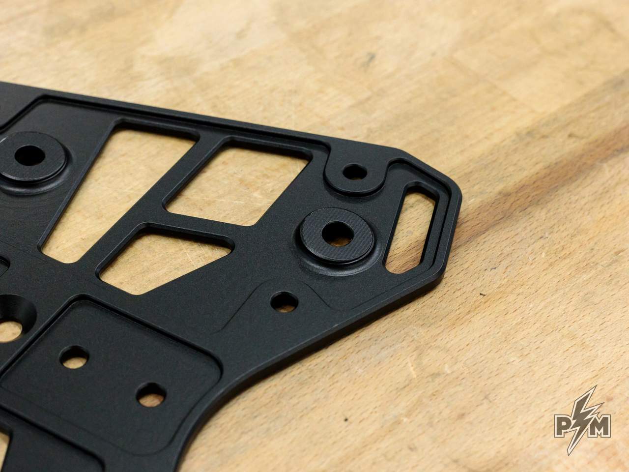 Perun moto Billet Top Rack Small for KTM 790 and 890 Adventure - detail of the CNC milled underside showing integrated 3D platform spacers