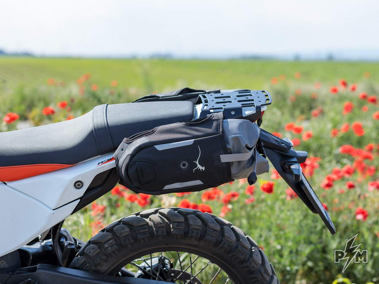 KTM 390 Adventure R or X / Enduro 390 Perun moto AuxPox supports side view with bags installed - test ride